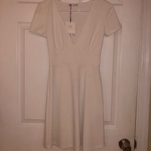 Mid length white Zara dress
